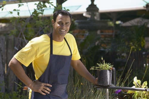 Hard and soft landscaping in a Winchmore Hill garden with stylish planting